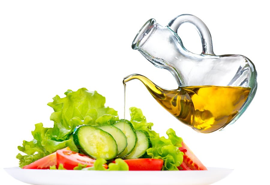 Healthy Vegetable Salad with Olive oil dressing isolated on whit