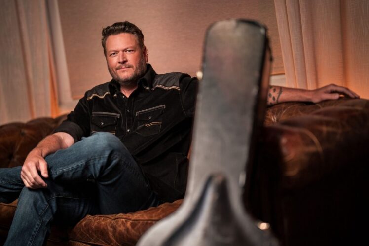Blake Shelton and guitar case